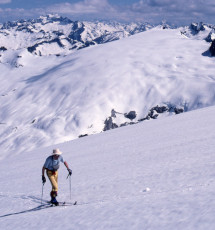 Lowell climbs toward Snowking Mtn.